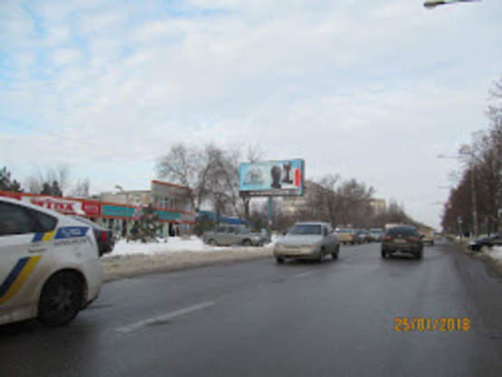 Фото рекламної площини за адресою Чаривная 145 (рынок)