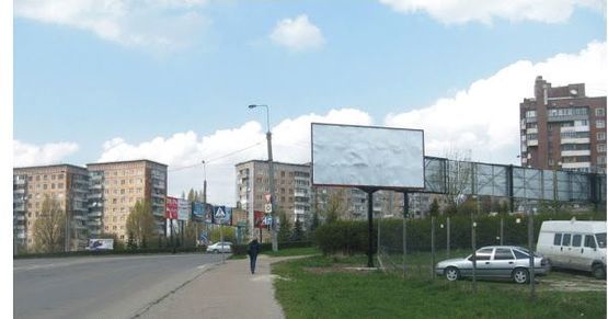 Фото рекламной плоскости по адресу вул. Коновальця біля кільця