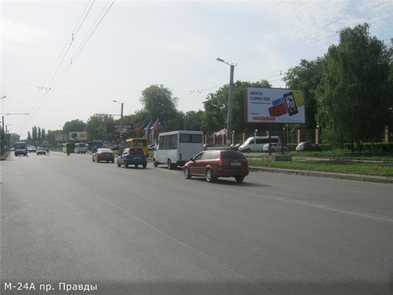 Фото рекламной плоскости по адресу просп.Правды (остановка Дендропарк)