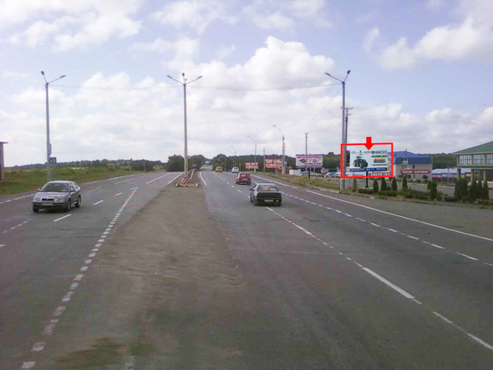 Фото рекламної площини за адресою Каменецкое шоссе ул., возле рынка "Караван"