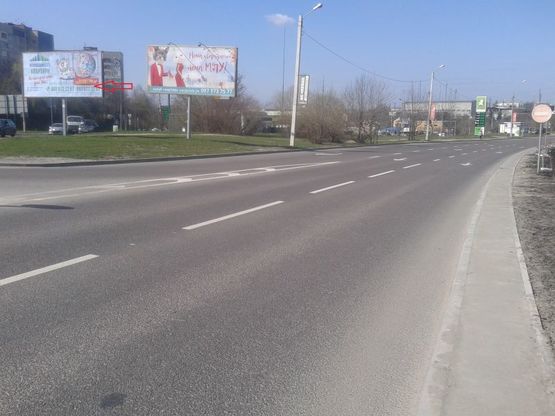 Фото рекламной плоскости по адресу Пр-т Червоної Калини-Чукаріна (поряд ТЦ ШУВАР)