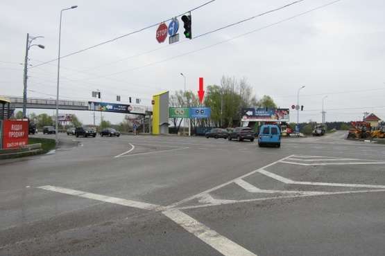 Фото рекламної площини за адресою Новообуховская трасса (Днепропетровское шоссе) напротив ТЦ "Мегамаркет", Мануфактура, за заправкой UPG, перед БРСМ,7км+300метров, направление в Киев (правая)