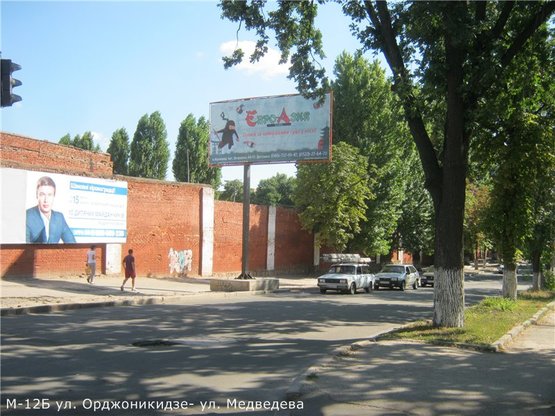 Фото рекламной плоскости по адресу ул. Орджоникидзе- ул. Медведева(Укрсиббанк, обл.филармония)