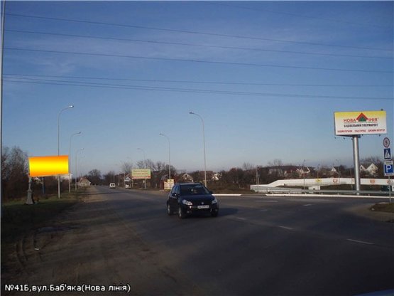 Фото рекламної площини за адресою вул.Баб'яка(новий трансп.міст), район ТЦ Нова лінія, напрям-вул.Загорська