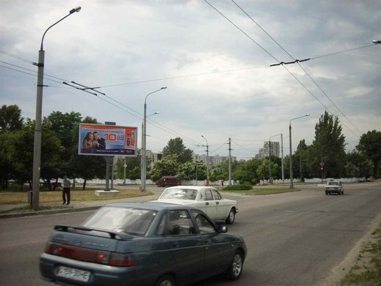 Фото рекламной плоскости по адресу вул.Привокзальна — вїзд на Південного мкрн., ст.Б (призматрон)