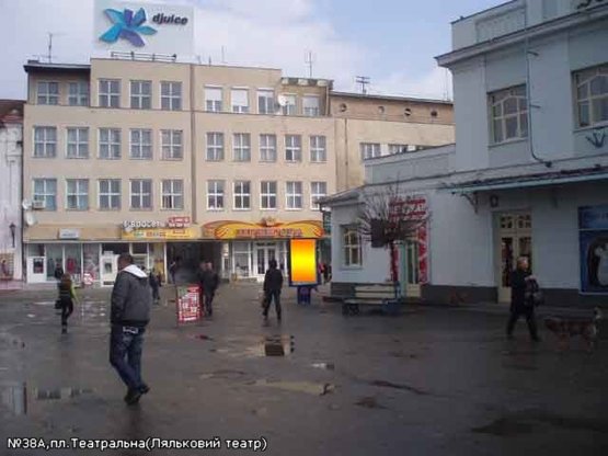 Фото рекламной плоскости по адресу пл.Театральна(Ляльковий театр),піш.зона, напрям-Пасаж