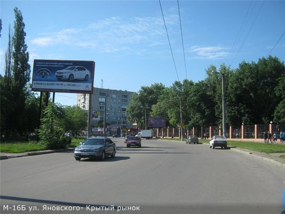 Фото рекламной плоскости по адресу ул. Яновского(Крытый рынок)