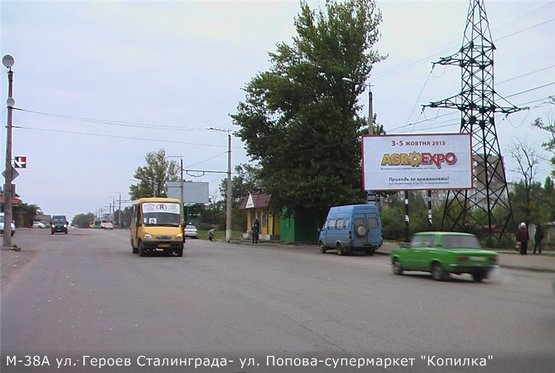 Фото рекламной плоскости по адресу ул. Героев Сталинграда- ул. Попова( "Копилка")