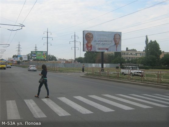 Фото рекламной плоскости по адресу ул. Попова (напротив супермаркета "Ятрань"кафе «Каприз»)