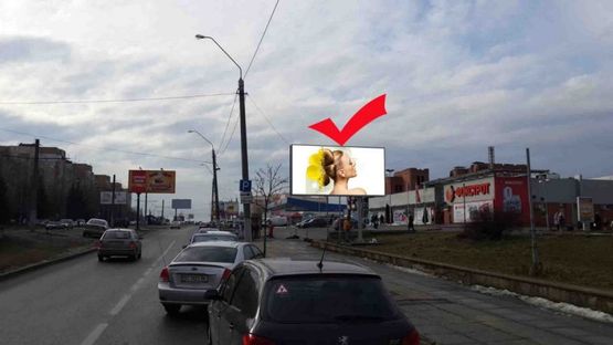 Фото рекламной плоскости по адресу вул.Кн.Ольги 106, універмаг Львів, до вул.Наукової