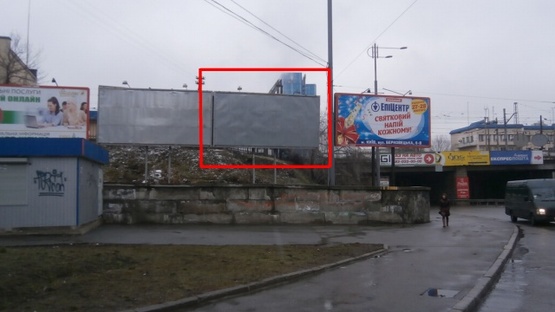Фото рекламної площини за адресою Василия Липковского ул. (Урицкого) /  Николая Осровского ул. (Максима Кривоноса площадь), возле ж/д моста (правый)