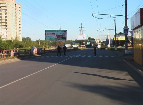 Фото рекламной плоскости по адресу ул. Попова, супермаркет АТБ