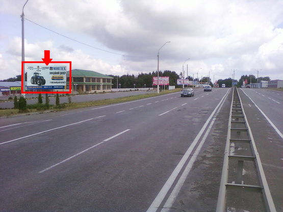 Фото рекламної площини за адресою Каменецкое шоссе, возле аэропорта, рын-ка "Караван"
