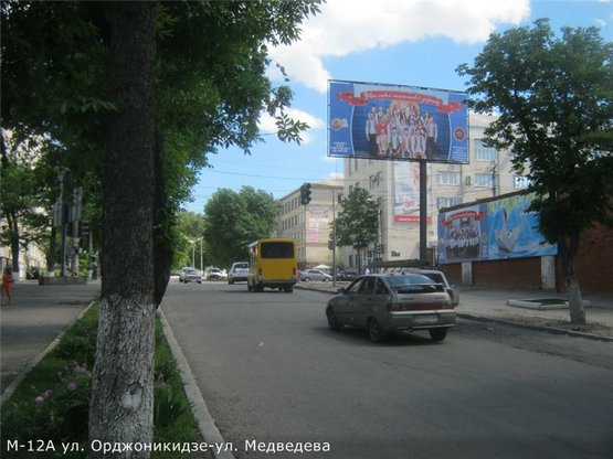 Фото рекламной плоскости по адресу ул. Орджоникидзе- ул.Медведева (Укрсиббанк, обл.филармония)