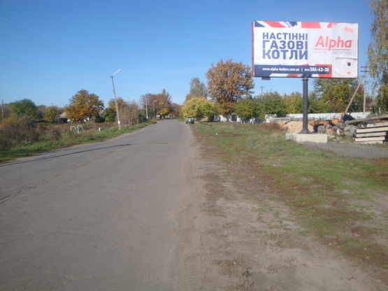 Фото рекламной плоскости по адресу ул.Октябрьская, 76