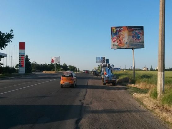 Фото рекламной плоскости по адресу Одесса-Николаев 21+800 А (в стор. Николаева)