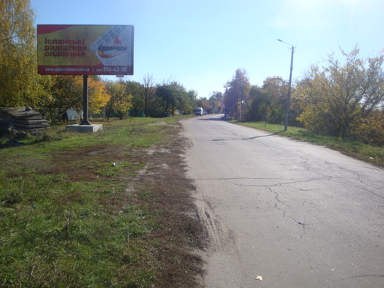 Фото рекламной плоскости по адресу ул.Октябрьская, 76