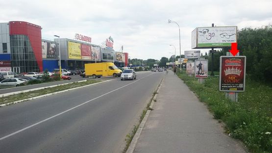 Фото рекламной плоскости по адресу Рыбалка М. ул., 2а, возле ТРЦ"Оазис", №1