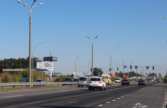 Фото рекламної площини за адресою пр-т Слобожанський, навпроти ТЦ "Метро", біля зупинки, світлофор