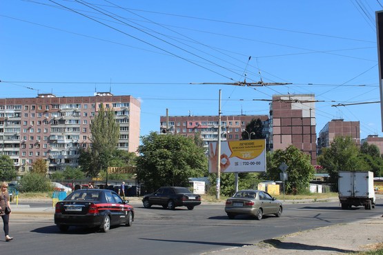 Фото рекламної площини за адресою пр-т Миру - вул. М. Михновського, на повороті з вул. М. Михновського на пр-т Миру