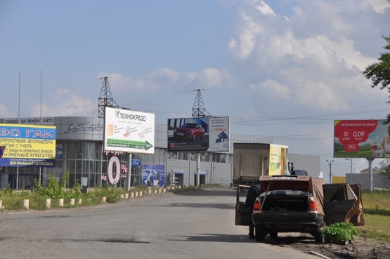 Фото рекламної площини за адресою вул. Дніпросталевська - авторинок (в'їзд з вул. О. Оцупа)