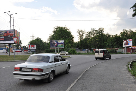 Фото рекламной плоскости по адресу Зоряний бульвар - магазин Автоленд, АТБ-маркет