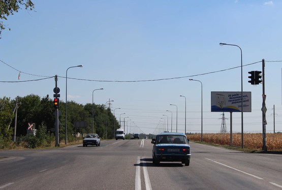 Фото рекламной плоскости по адресу вул. Яснополянська - вул. Старокодацька, до аеропорту, на світлофорі