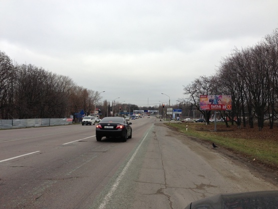 Фото рекламной плоскости по адресу Запорізьке шосе - вул. Панікахи, світлофор