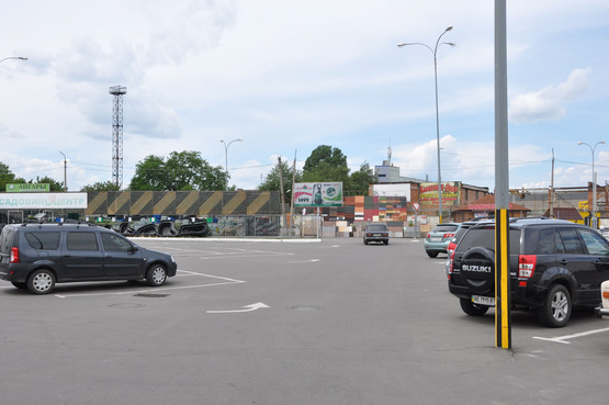 Фото рекламной плоскости по адресу паркінг маркету Нова Лінія