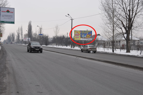 Фото рекламной плоскости по адресу вул. Київська - пр-т І. Мазепи, ринок, АТБ-маркет, Varus
