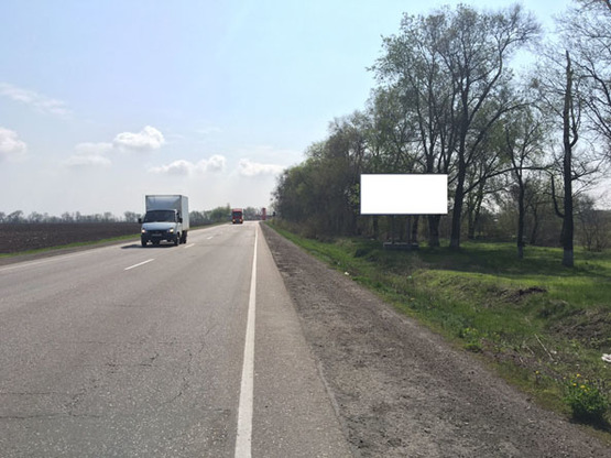 Фото рекламной плоскости по адресу траса Петриківка - Лобойківка, в сторону м. Дніпро