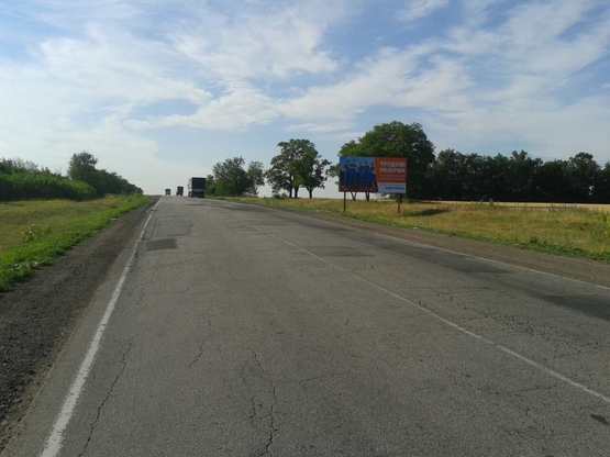 Фото рекламной плоскости по адресу траса Петриківка - Царичанка, в сторону м. Дніпро