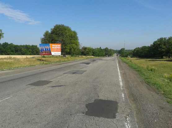 Фото рекламної площини за адресою траса Петриківка - Царичанка, в сторону м. Кобеляки