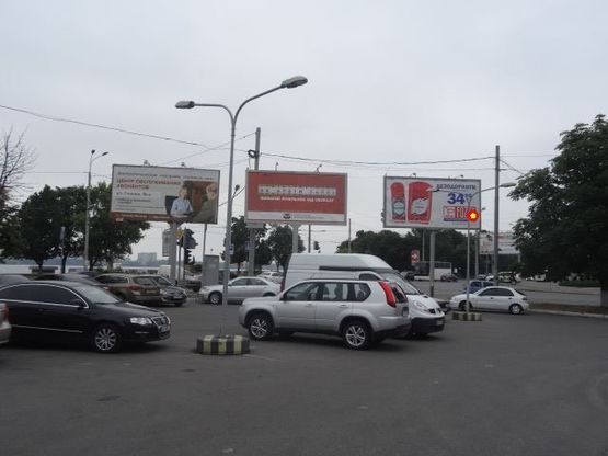 Фото рекламної площини за адресою Сичеславская Набережная ул. - Коцюбинского ул., возле цирка, из центра