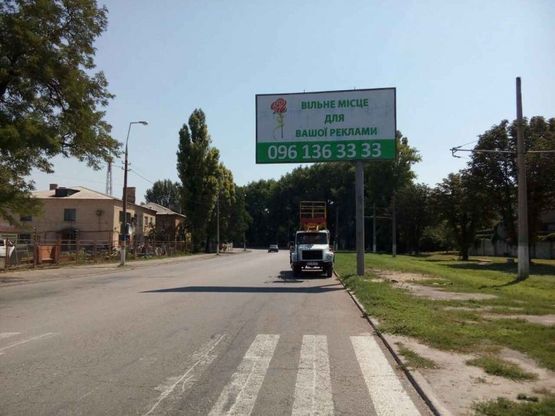 Фото рекламной плоскости по адресу дз02А,вул. Січеславський шлях навпроти АГЗС "ВостокГаз"