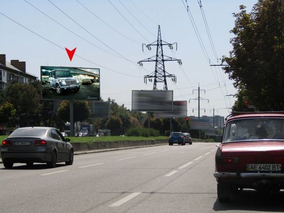 Фото рекламной плоскости по адресу m002A,просп. О.Поля, 80, рух вгору (РОЗМІР РЕКЛАМНОЇ ПЛОЩИНИ 5,9Х2,9)