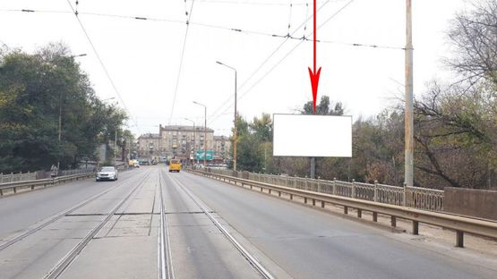 Фото рекламної площини за адресою s098A,з'їзд з Амурського мосту на Правий берег