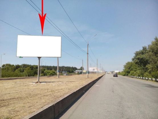 Фото рекламной плоскости по адресу дз16А2,Мостовий перехід через Дніпро, зїзд, біля АЗС "WOG", рух з правого на лівий берег