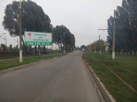 Фото рекламной плоскости по адресу дз32А1,вул. Січеславський шлях (р-н з/д моста ВАТ "Баглійкокс") - на розділовій смузі