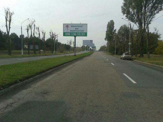Фото рекламной плоскости по адресу дз43А1,Єлізаветівська траса (на розділовій смузі в районі мостового перехіду)