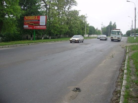 Фото рекламной плоскости по адресу Нигинское шоссе/ул. Северная/ул. Суворова