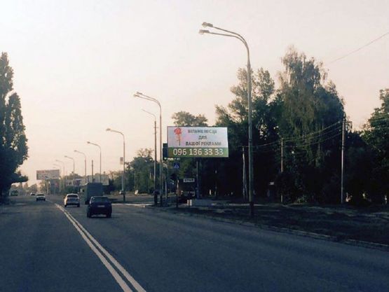 Фото рекламной плоскости по адресу Пв12А,вул. Дніпровська, в районі буд. №315, біля світлофора