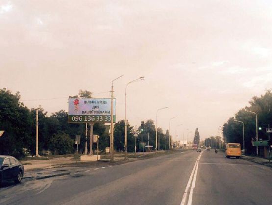 Фото рекламної площини за адресою Пв12Б,вул. Дніпровська, в районі буд. №315, біля світлофора