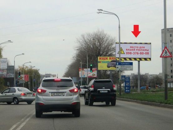 Фото рекламной плоскости по адресу Пв13А,вул. Дніпровська, в районі б.420, біля світлофора