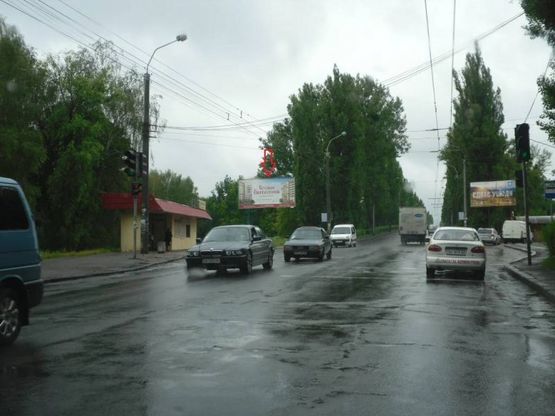 Фото рекламной плоскости по адресу м. Рівне, вул. Соборна,  навпроти буд. 420