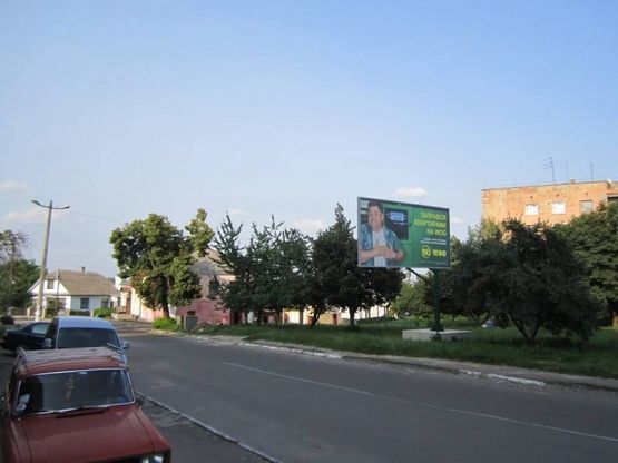 Фото рекламної площини за адресою м. Острог,  вул. Татарська, навпроти буд. №2