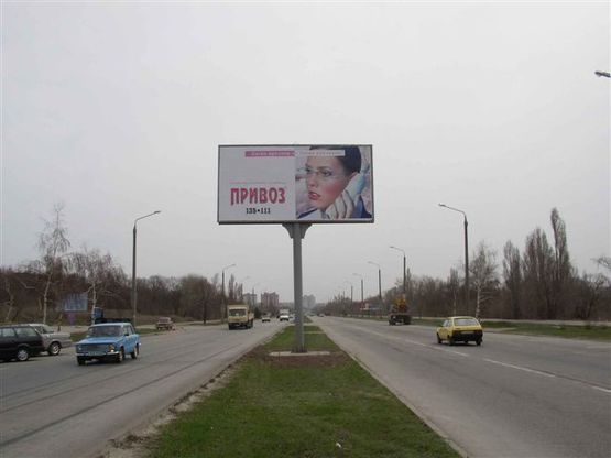 Фото рекламной плоскости по адресу Набережна магістраль - Вознесенівський ринок, напрямок руху до вокзалу