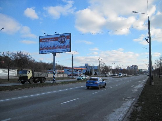 Фото рекламної площини за адресою Набережна магістраль – АЗС Укртатнафта, автосалон "Міцубісі", напрямок руху до вокзалу