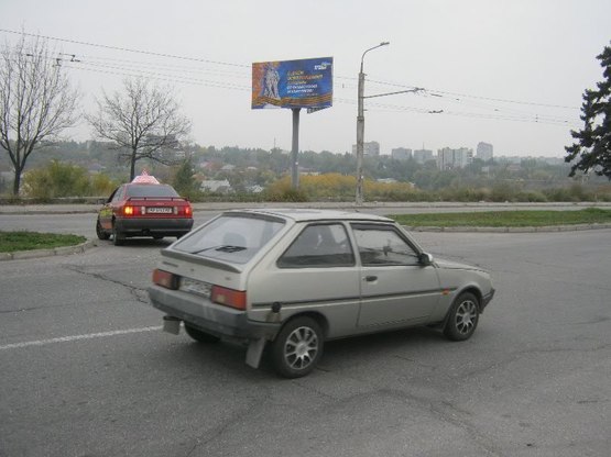 Фото рекламной плоскости по адресу вул.Перемоги,129а - напроти БК "Титан";  рядом с АЗС ВОГ, ст.Б