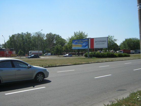 Фото рекламной плоскости по адресу Набережна магістраль – вул.Українська, рух до порту, права площина